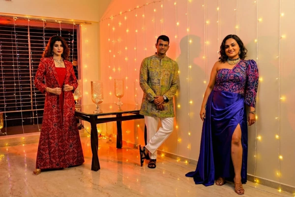 Woman wearing an Indo Western Patola outfit showcasing rich double ikat patterns, bold colours, and contemporary tailoring inspired by traditional Indian craftsmanship.